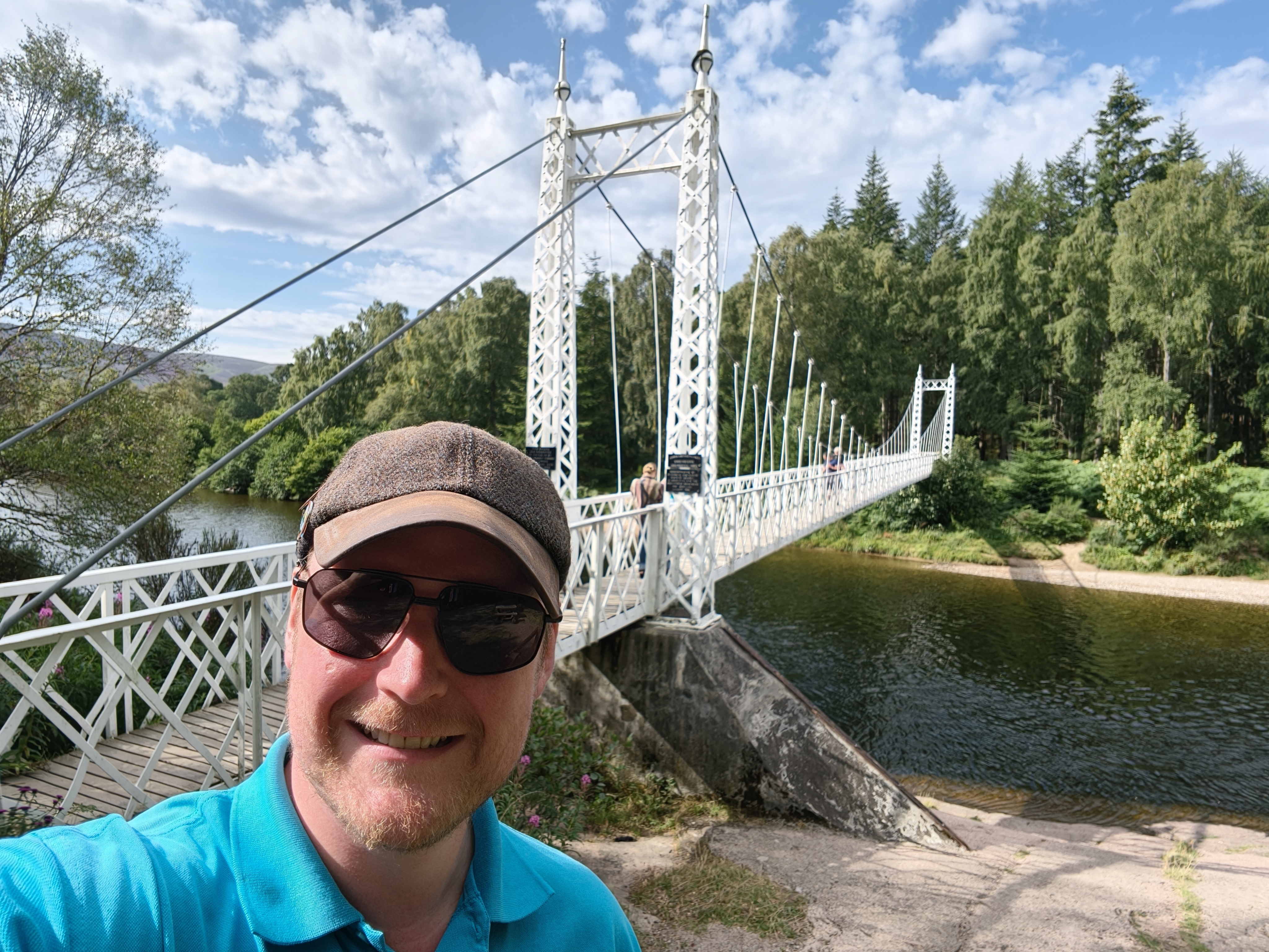 Jamie beside a suspension bridge in Royal Deeside