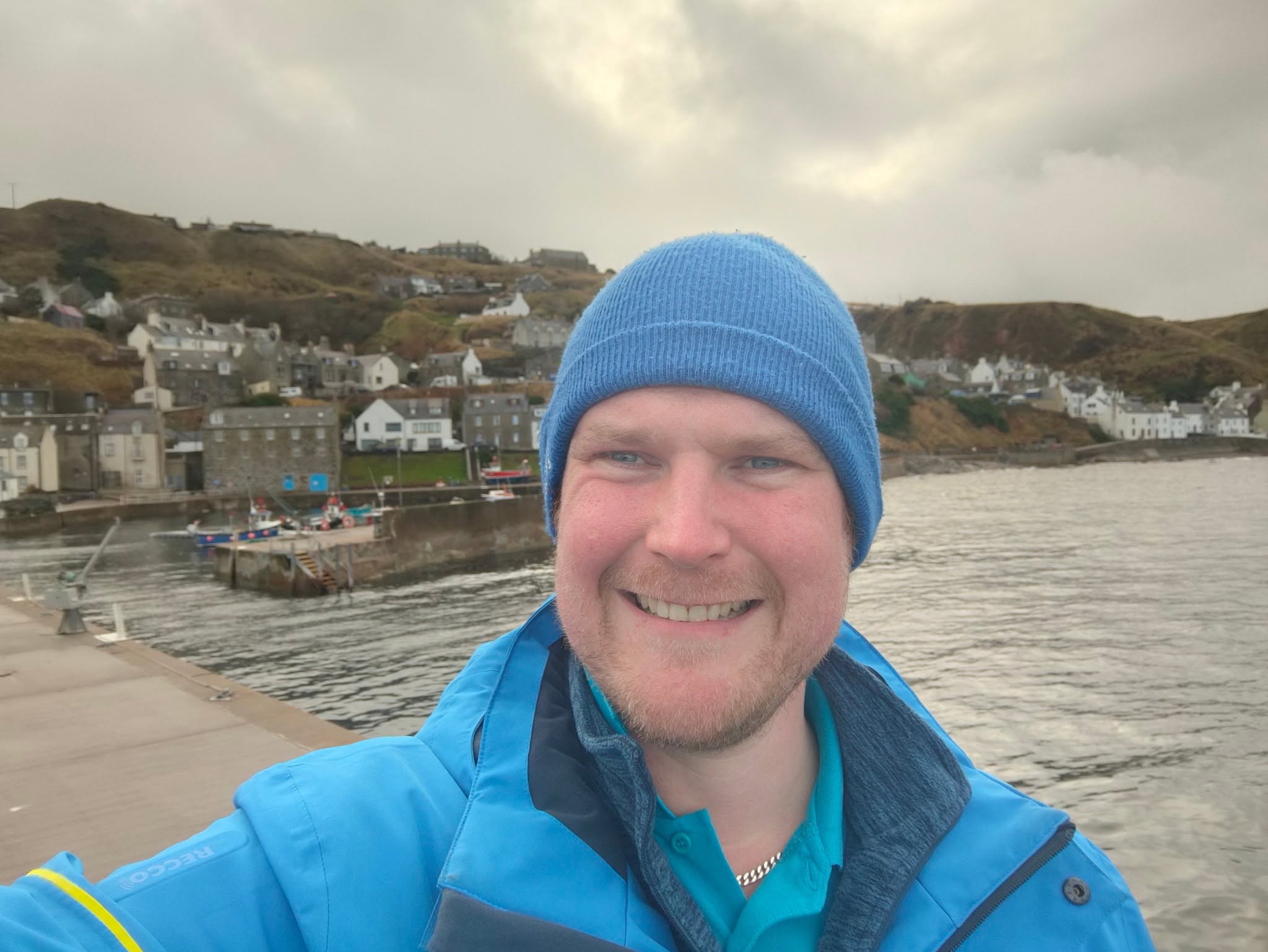 Jamie Robertson, local guide for A Path Less Known Tours, at a north-east harbour