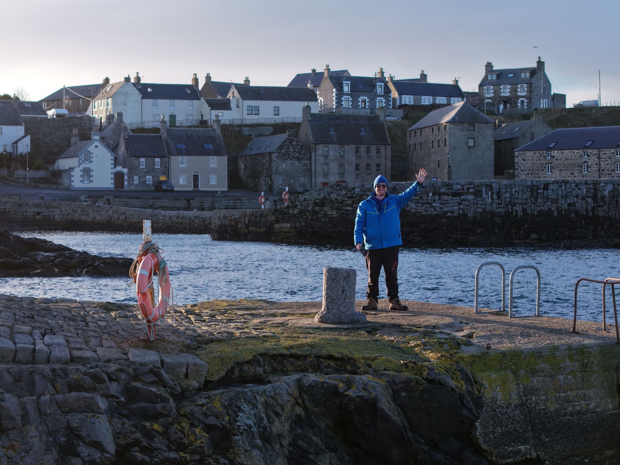 Your guide beside a coastal village in Aberdeenshire